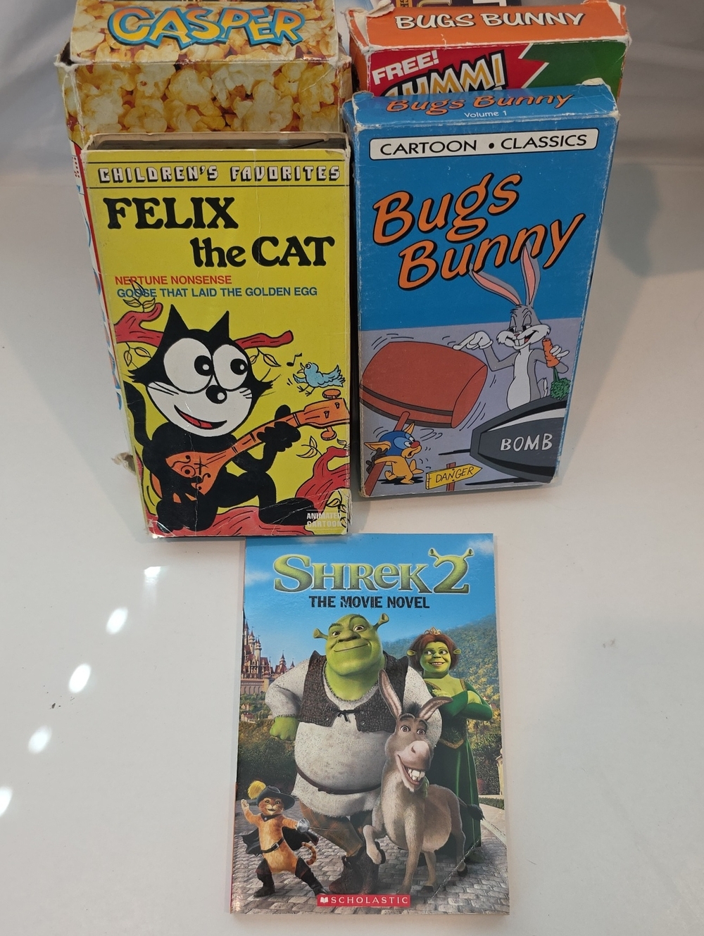 4 VHS Kids Movies And Shrek 2 Paperback Book